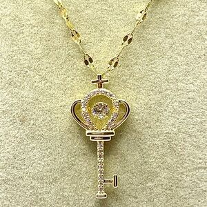 Rhinestone Key Pendant Necklace Heart Shaped and Cross Detail. Gold tone. 18 in.